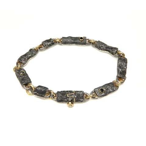 Iron Bracelet with Gold Links and Black Diamonds