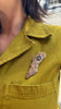 Rock You Like a Hurricane Brooch