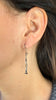Slit and Drift Earrings with Oval Center